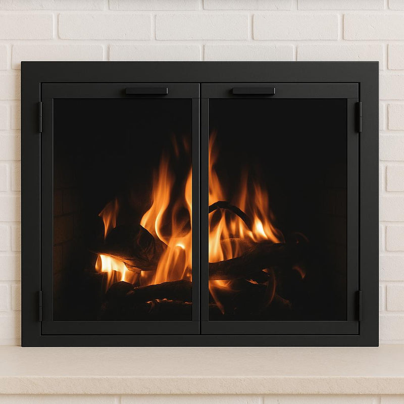 Custom black steel fireplace doors with heat-resistant glass installed in a fireplace