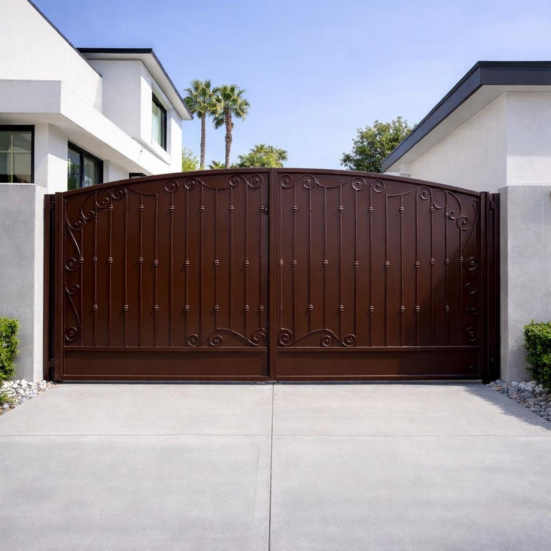 Custom steel driveway gate with powder-coated finish by Crownforge Iron