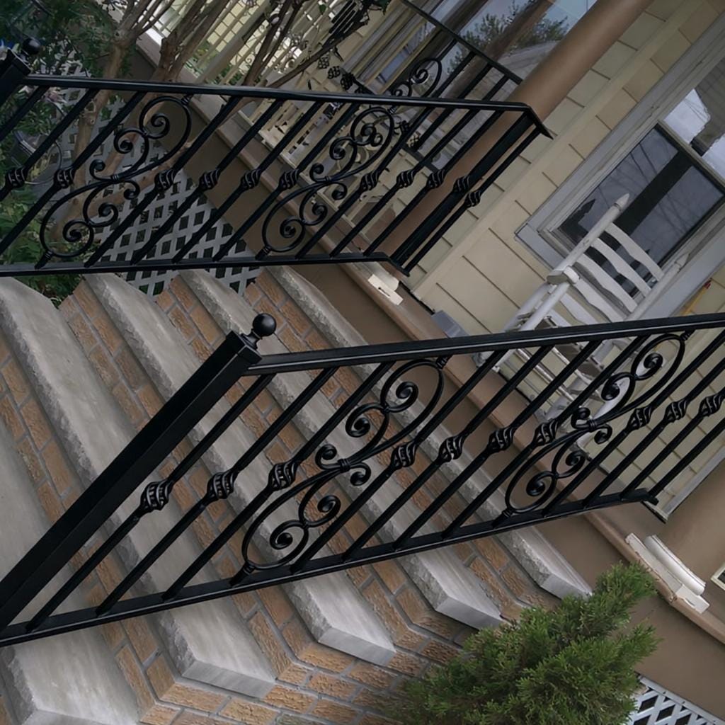 Custom Wrought Iron Stair Handrail by the steel fabrication shop, product image 2