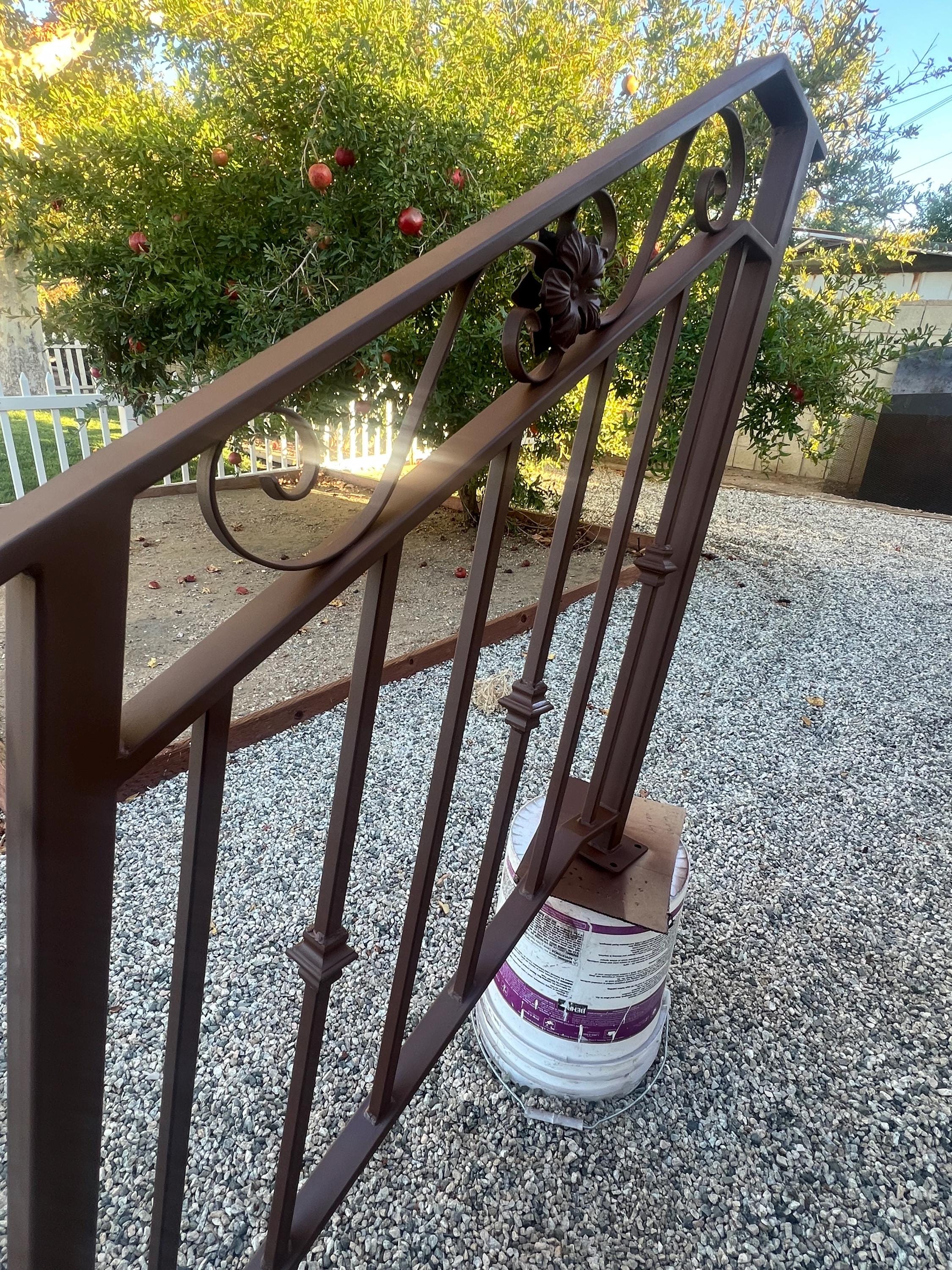 Wrought Iron Stair Railing: Decorative Steel Handrail with Scrolls by the steel fabrication shop, product image 1