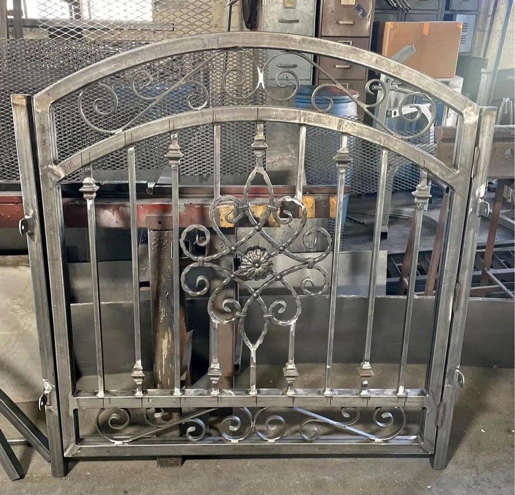 Handcrafted Wrought Iron Garden Gate: Arched Floral Entry, Custom Size by the steel fabrication shop, product image 1