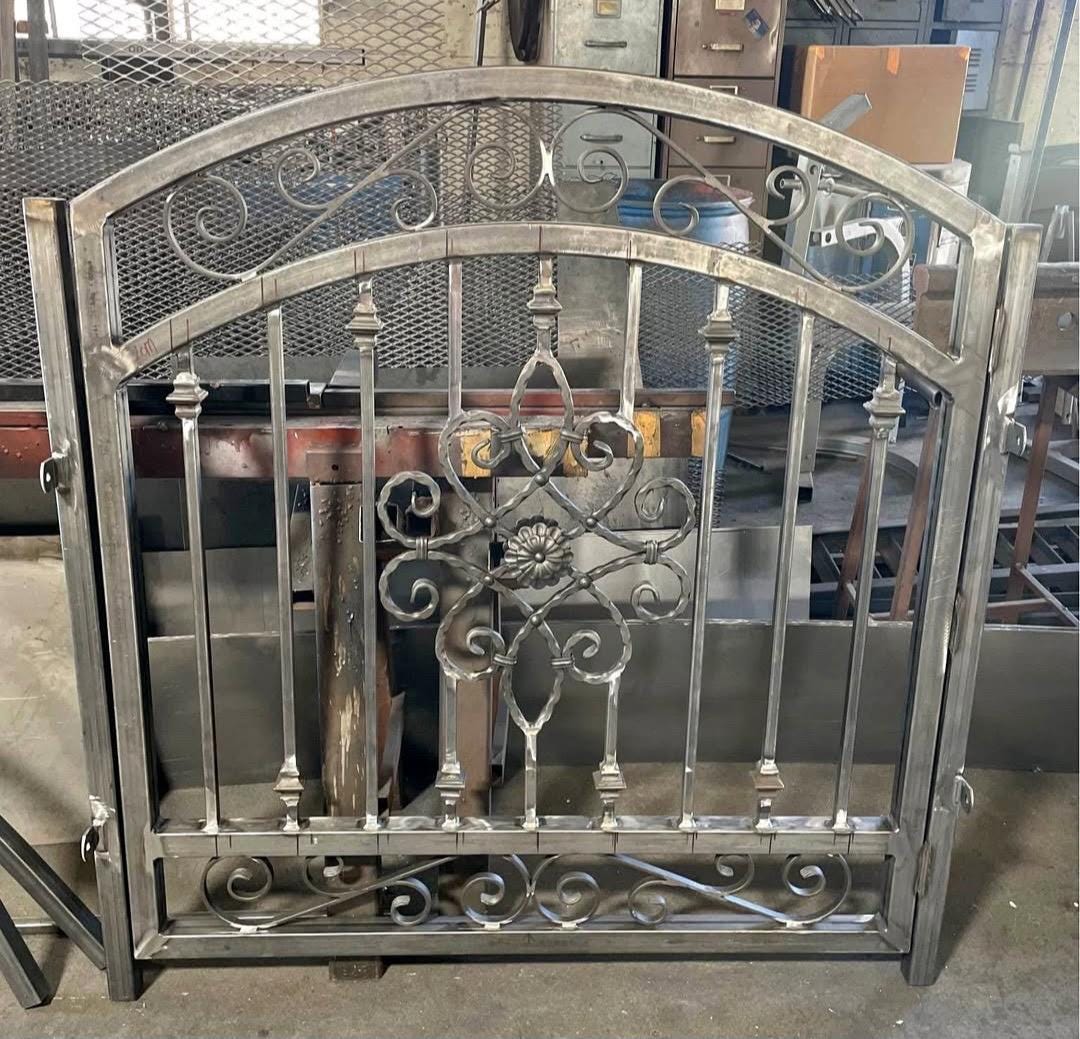 Handcrafted Wrought Iron Garden Gate: Arched Floral Entry, Custom Size by the steel fabrication shop, product image 1