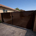 Modern Steel Driveway Gate – Horizontal Privacy Gate, Custom Iron Entry Gate, Contemporary Bi-Fold Metal Door by the steel
