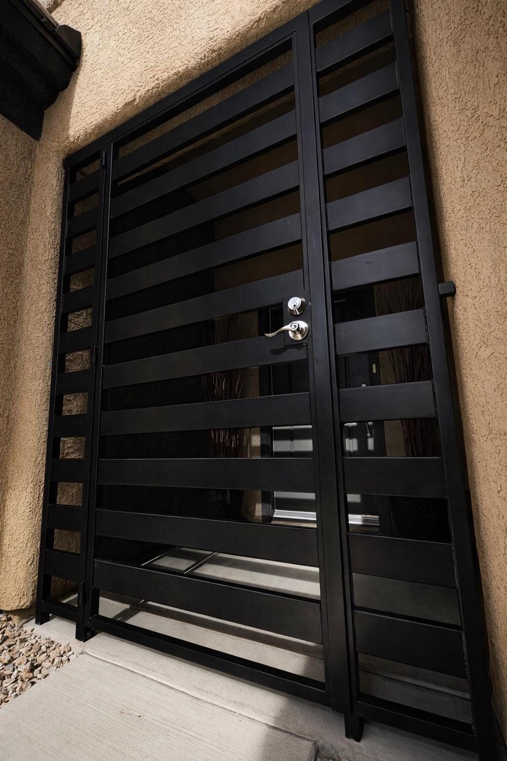 Modern Steel Security Door – Horizontal Slat Entry, Custom Welded Exterior Door by the steel fabrication shop, product image
