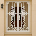 Handmade Wrought Iron Double Security Door: Floral Steel Entry Gate by the steel fabrication shop, product image 1