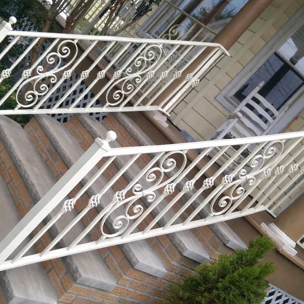 Custom Wrought Iron Stair Handrail by the steel fabrication shop, product image 3