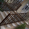 Custom Wrought Iron Stair Handrail by the steel fabrication shop, product image 1