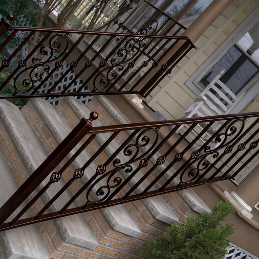 Custom Wrought Iron Stair Handrail by the steel fabrication shop, product image 1