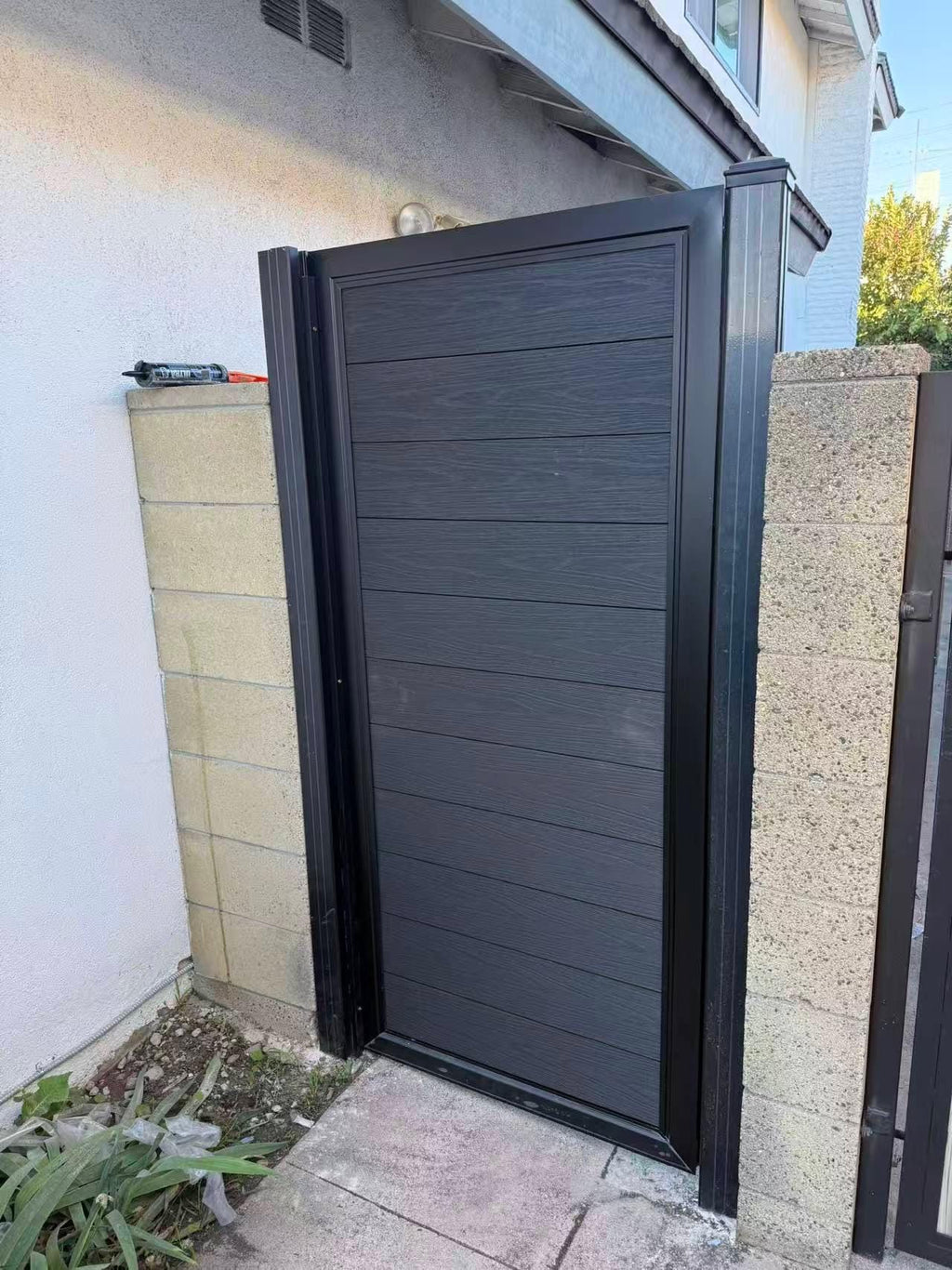 Modern Aluminum Privacy Gate with Composite Wood Panels by the steel fabrication shop, product image 2