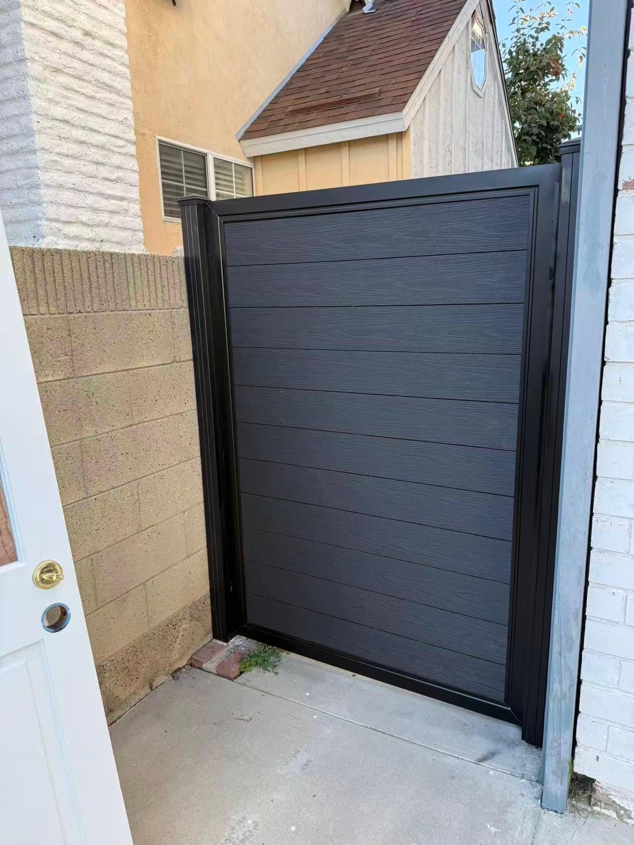 Modern Aluminum Privacy Gate with Composite Wood Panels by the steel fabrication shop, product image 3