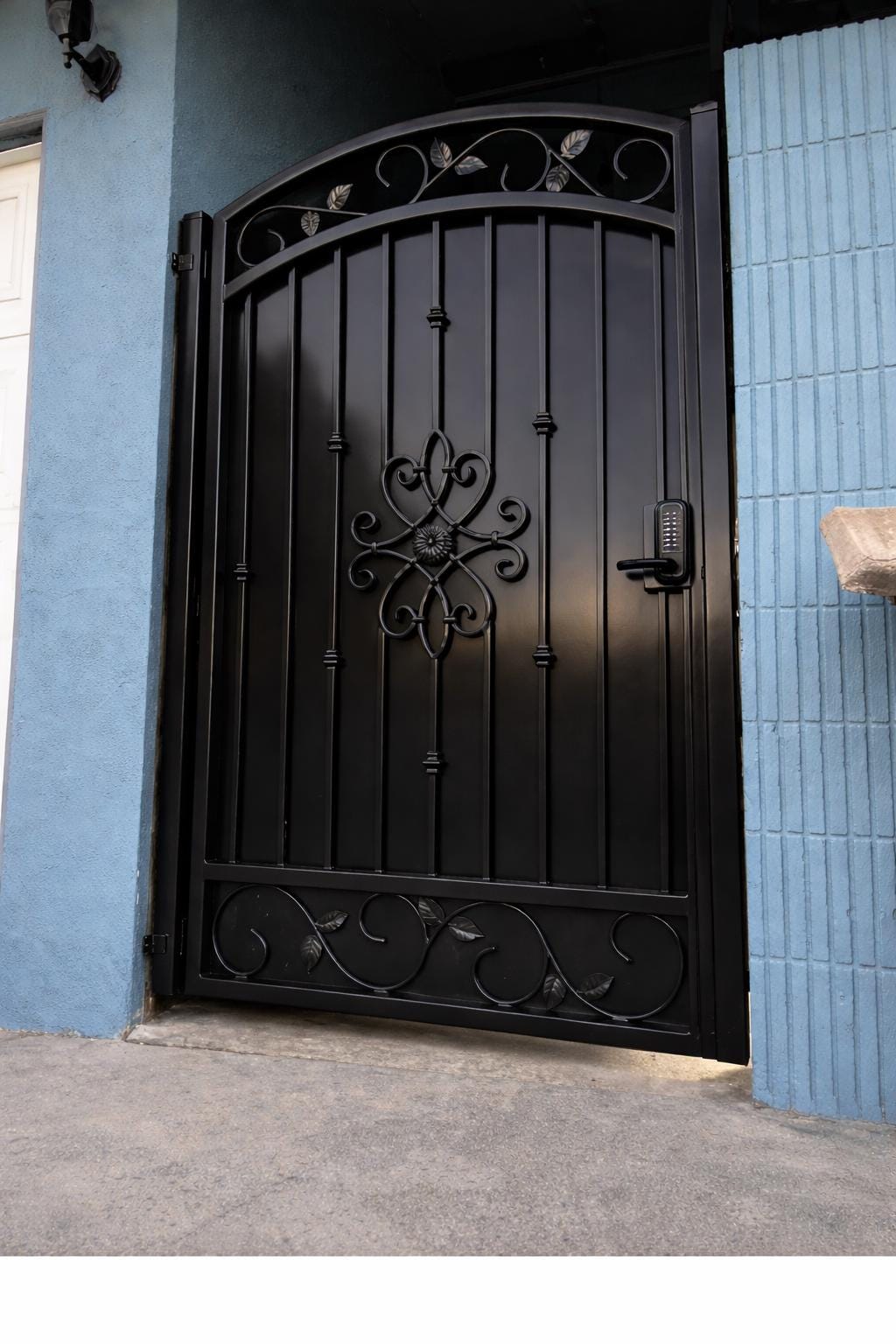 Norvanta Forge Arched Wrought Iron Entry Door - Decorative Scroll Security Gate, Matte Black by the steel fabrication shop